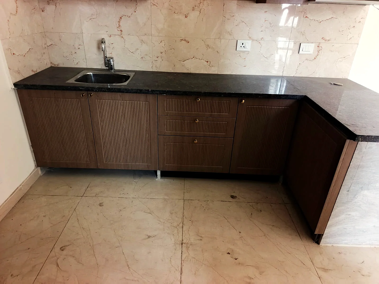 Modular kitchen with stone counters