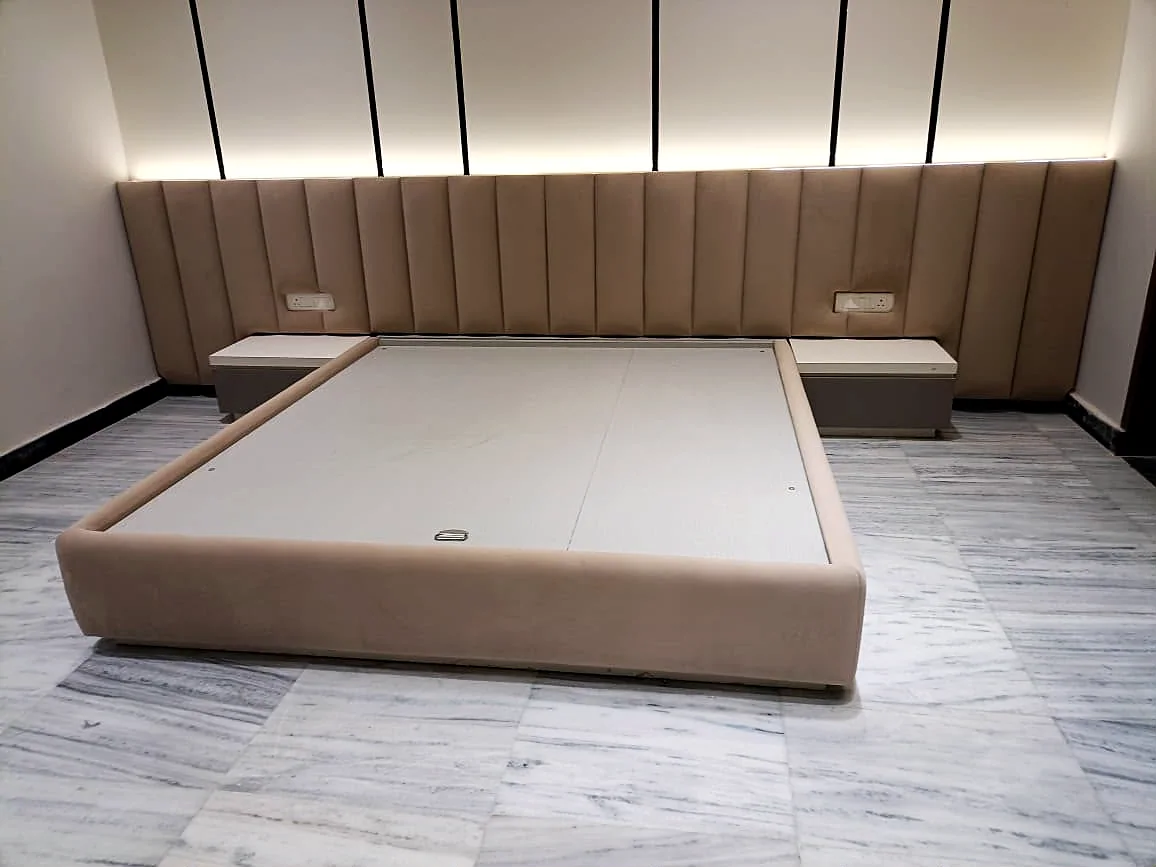 Upholstered channel headwall bed in a master bedroom