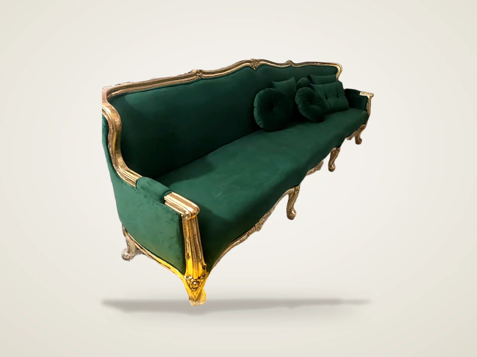 Emerald velvet settee with gold-leaf carved frame